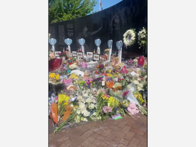 Memorial For Highland Park Victims Erected On-Site of Mass Shooting