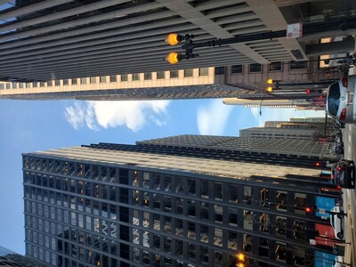 Hundreds of teenagers flood into downtown Chicago, smashing car windows.